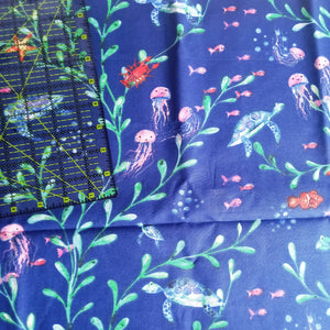 100% Cotton Fabric Deep Blue Background with Turtles, Jellyfish, Lobster, Starfish, fish and Seaweed 